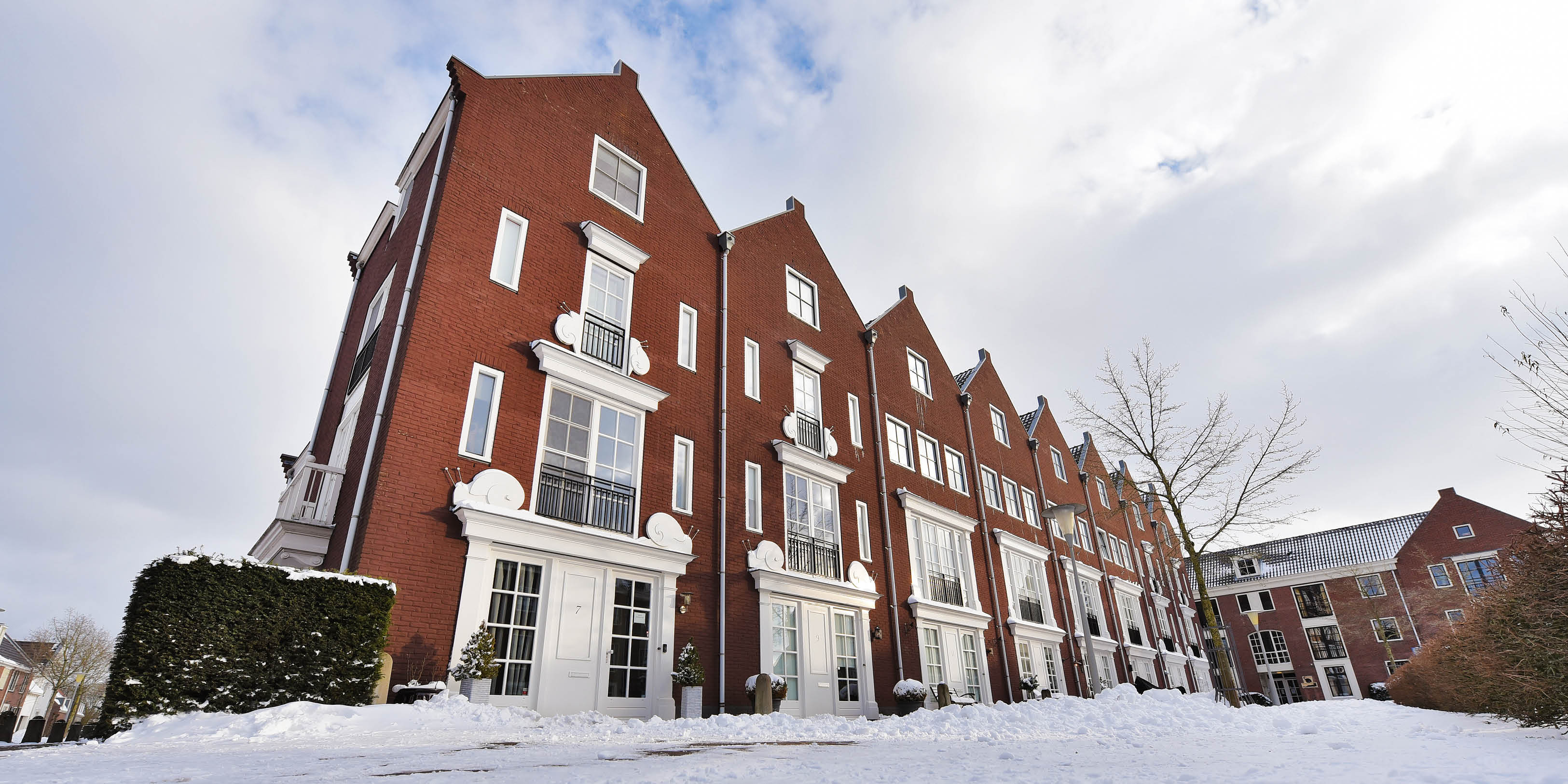 Buurt in beeld - Vestingstad - Rijwoningen in sneeuw